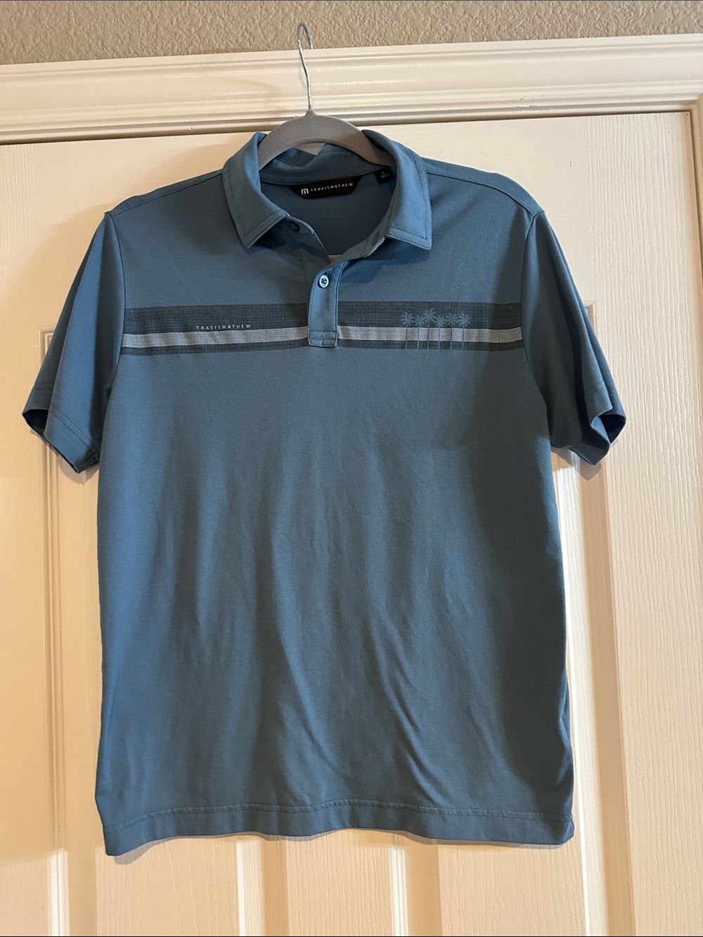 Travis Mathew Boys size L Blue Short-Sleeve Polo with Chest Stripe